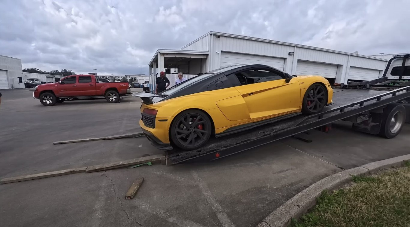 Heavy-duty towing service for yellow sports car in Norwalk, CT